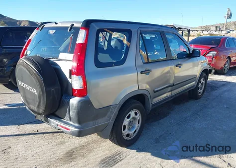 2006 Honda Cr-V Lx z USA, uszkodzony, nr VIN JHLRD68536C008313